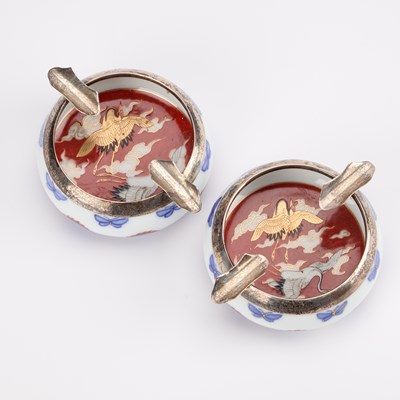 Lot 104 - A PAIR OF JAPANESE FUKAGAWA PORCELAIN AND ENGLISH SILVER ASHTRAYS