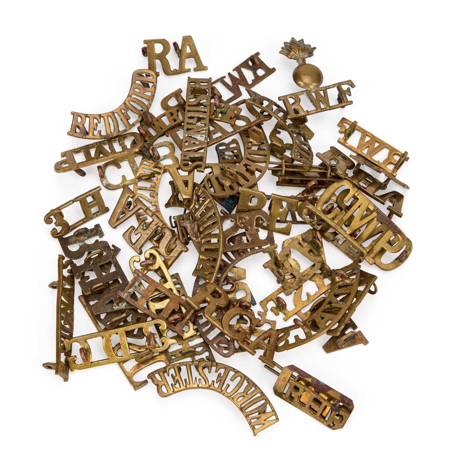 Lot 29 - A GROUP OF MILITARY SHOULDER TITLES/ BADGES