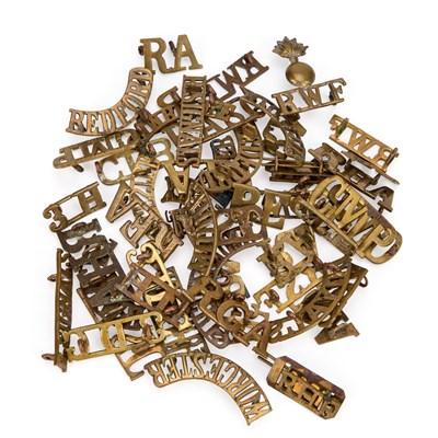 Lot 29 - A GROUP OF MILITARY SHOULDER TITLES/ BADGES
