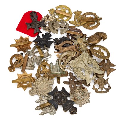 Lot 25 - A GROUP OF MILITARY CAP BADGES
