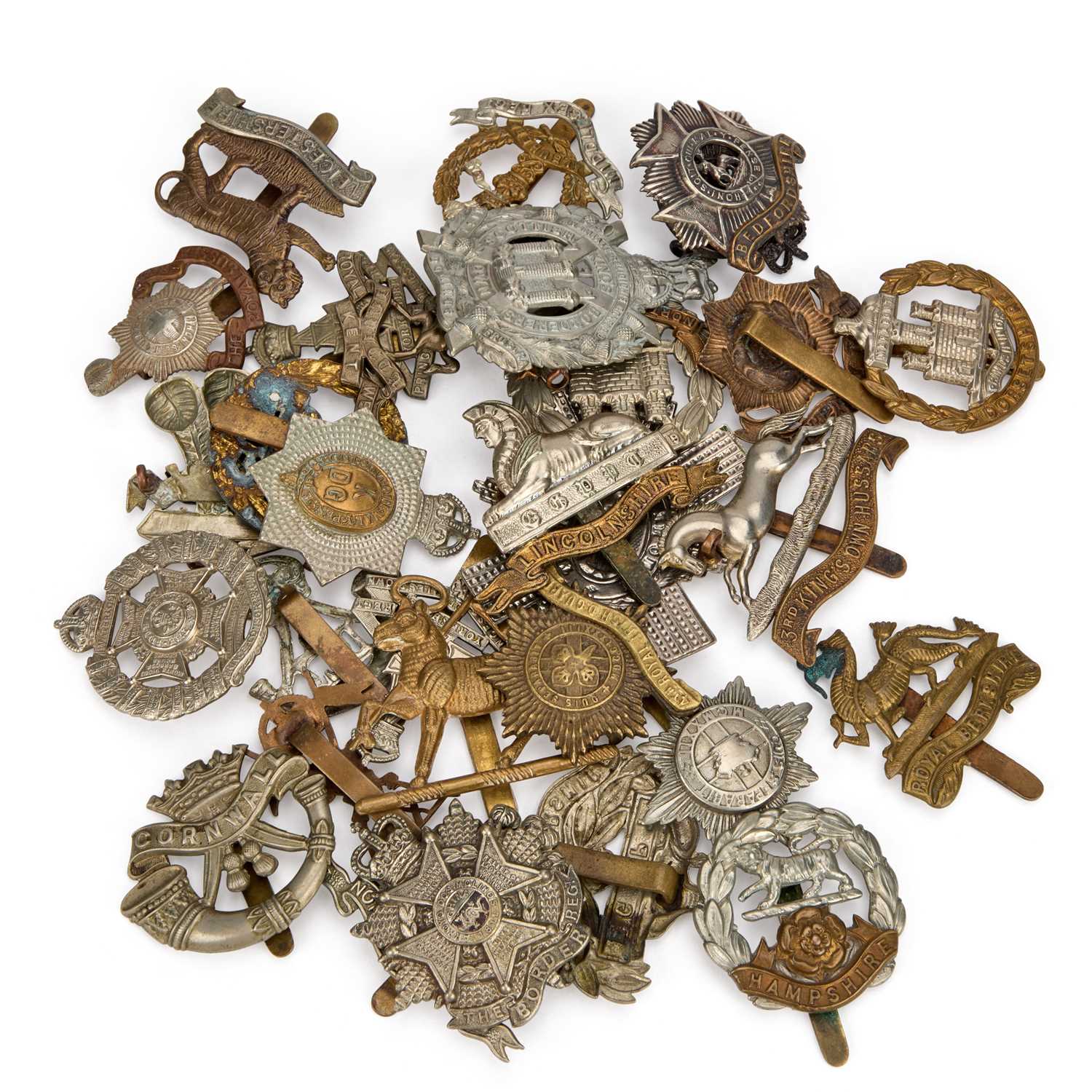 Lot 40 - A GROUP OF MILITARY CAP BADGES