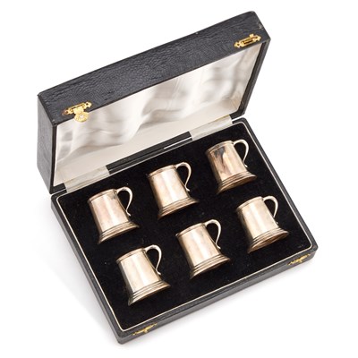 Lot 354 - A SET OF SIX STERLING SILVER MINIATURE TANKARDS