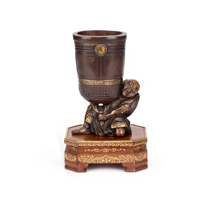 Lot 142 - A JAPANESE BRONZE AND PARCEL-GILT FIGURE
