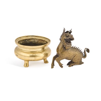 Lot 135 - A SMALL CHINESE BRONZE TRIPOD CENSER AND A CHINESE MODEL OF A QILIN