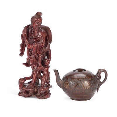 Lot 71 - A CHINESE CARVED COCONUT TEAPOT