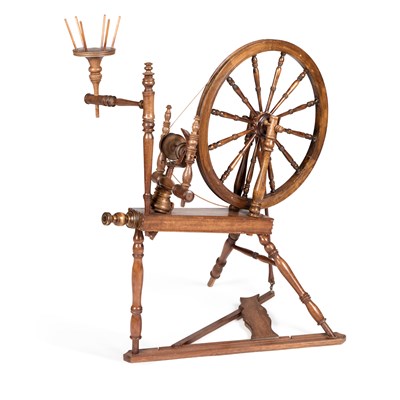 Lot 540 - A STAINED BEECH SPINNING WHEEL