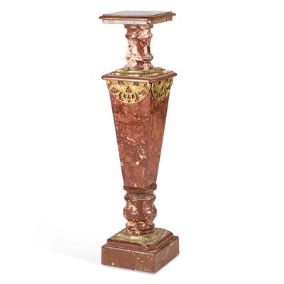 Lot 678 - AN ORMOLU-MOUNTED RED MARBLE TORCHERE