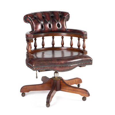 Lot 676 - A LEATHER UPHOLSTERED CAPTAINS CHAIR