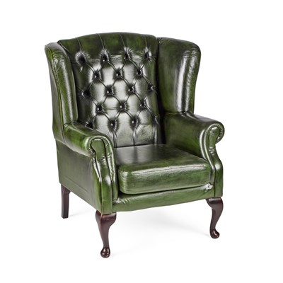 Lot 685 - A GREEN LEATHER WING-BACK ARMCHAIR