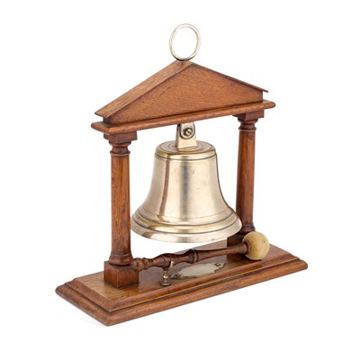 Lot 664 - AN EDWARDIAN OAK AND SILVERED METAL TABLE BELL