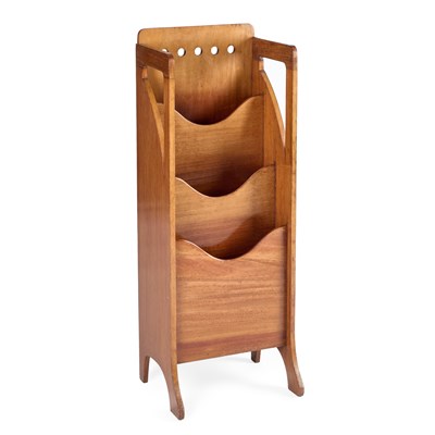 Lot 699 - A GLASGOW STYLE WALNUT MAGAZINE RACK