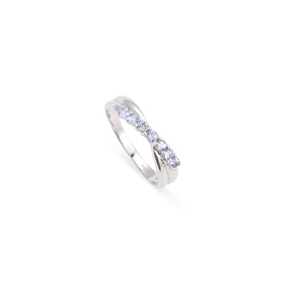 Lot 396 - A 9 CARAT WHITE GOLD TANZANITE HALF HOOP TWIST RING