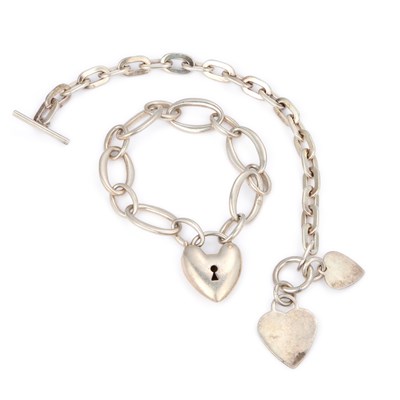 Lot 452 - TWO SILVER FANCY CURB LINK BRACELETS WITH HEART CLASPS