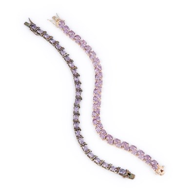 Lot 438 - TWO SILVER AMETHYST LINE BRACELETS