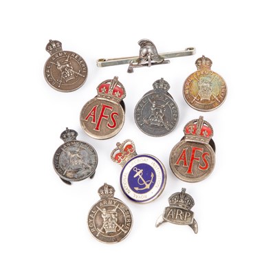 Lot 24 - A GROUP OF SILVER LAPEL BADGES