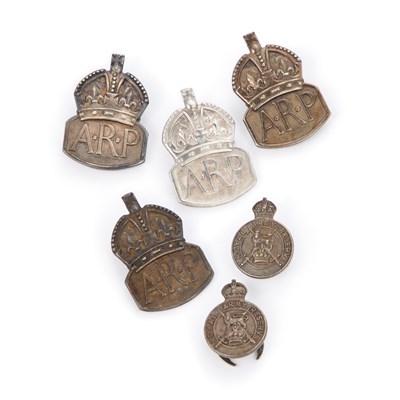 Lot 27 - A GROUP OF SILVER SECOND WORLD WAR A.R.P. BADGES AND ROYAL ARMY RESERVES BADGES