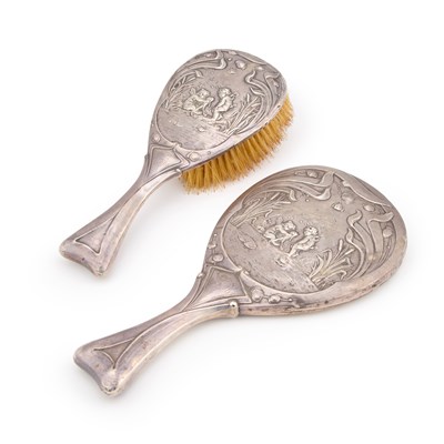 Lot 95 - A GEORGE V SILVER-MOUNTED DRESSING TABLE BRUSH AND HAND MIRROR