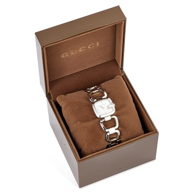 Lot 133 - A LADY'S STEEL GUCCI BRACELET WATCH