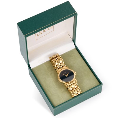 Lot 135 - A GOLD PLATED GUCCI BRACELET WATCH