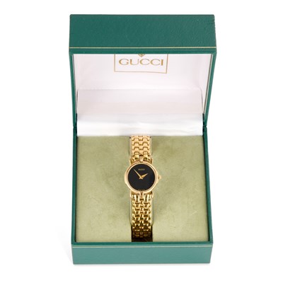 Lot 141 - A LADY'S GOLD PLATED GUCCI BRACELET WATCH