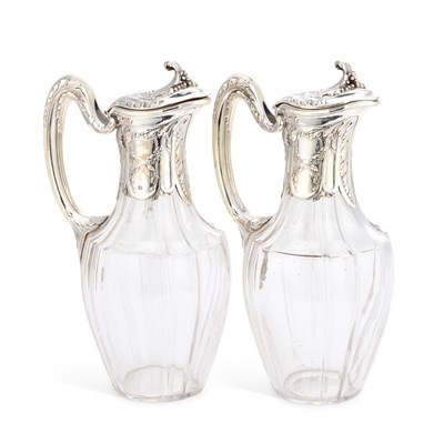 Lot 168 - A PAIR OF FRENCH SILVER-MOUNTED CLARET JUGS