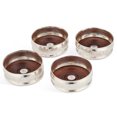 Lot 333 - A SET OF FOUR GEORGE III SILVER COASTERS