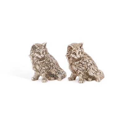 Lot 219 - A PAIR OF ELIZABETH II CAST SILVER MODELS OF CATS