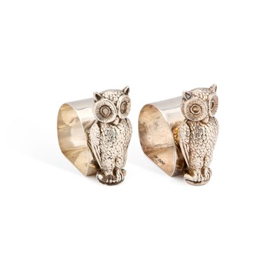 Lot 245 - A PAIR OF GEORGE V SILVER NOVELTY NAPKIN RINGS