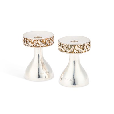 Lot 221 - A PAIR OF ELIZABETH II SILVER CANDLESTICKS