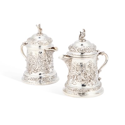 Lot 275 - A NEAR PAIR OF EDWARDIAN SILVER FLAGONS