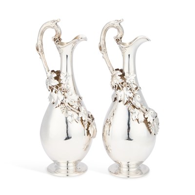 Lot 288 - A PAIR OF VICTORIAN SILVER EWERS