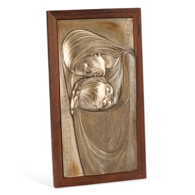 Lot 101 - A SILVERED METAL PLAQUE