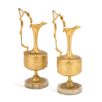 Lot 97 - A PAIR OF BRONZE EWERS