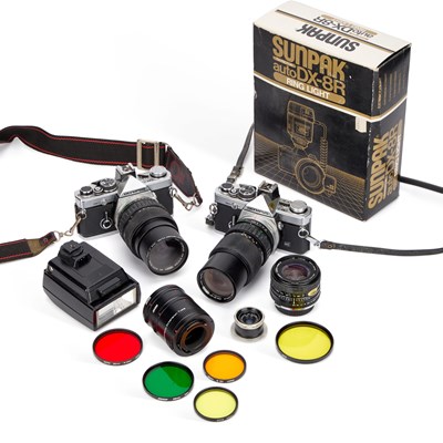 Lot 181 - TWO OLYMPUS OM-2N MD 35MM SLR CAMERAS AND AN OLYMPUS OM-2 FLASH