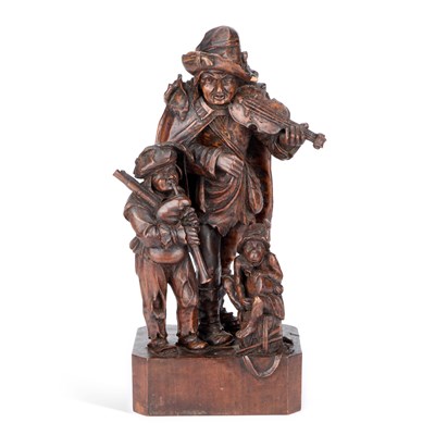 Lot 562 - A 19TH CENTURY CARVED FIGURE GROUP
