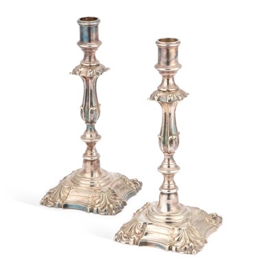 Lot 120 - A PAIR OF 19TH CENTURY SILVER-PLATED CANDLESTICKS