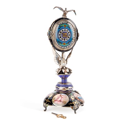 Lot 521 - A VIENNESE SILVER AND ENAMEL TABLE CLOCK