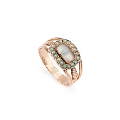 Lot 480 - A 19TH CENTURY EYE MINIATURE AND SEED PEARL SENTIMENTAL RING