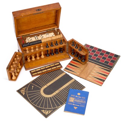 Lot 730 - A VICTORIAN OAK GAMES COMPENDIUM