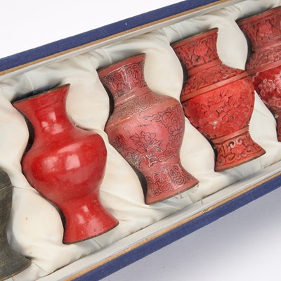 Lot 66 - A DIORAMA OF EIGHT CHINESE VASES SHOWING CINNABAR LACQUER VASES SHOWING THE STAGES OF PRODUCTION