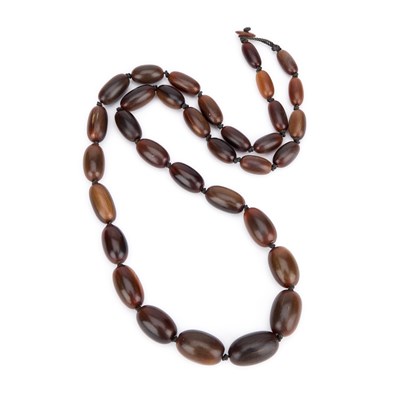 Lot 79 - A RHINO HORN BEAD NECKLACE