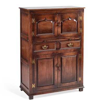 Lot 648 - AN OAK PANELLED CABINET