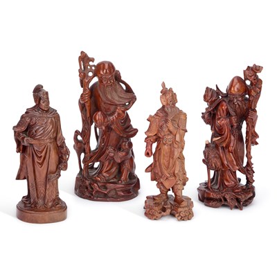 Lot 101 - A GROUP OF FOUR ORIENTAL CARVED WOODEN FIGURES