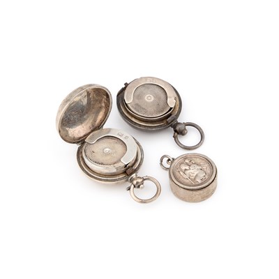 Lot 127 - THREE SILVER SOVEREIGN OR COIN HOLDERS