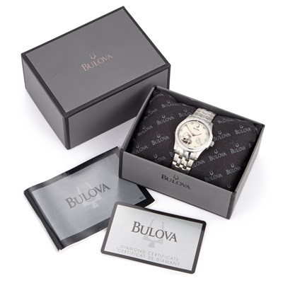 Lot 143 - A LADY'S STEEL BULOVA BRACELET WATCH