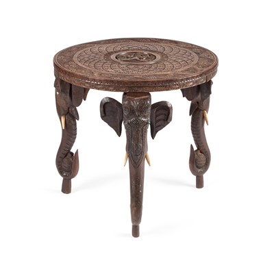Lot 656 - AN ANGLO-INDIAN CARVED HARDWOOD OCCASIONAL TABLE