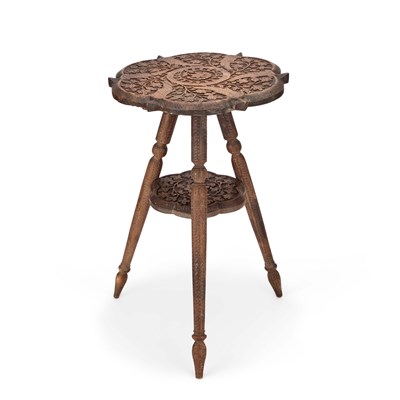 Lot 637 - AN INDIAN CARVED HARDWOOD TABLE