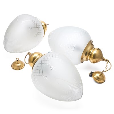 Lot 308 - A TRIO OF BRASS AND FROSTED GLASS PENDANT CEILING LIGHTS