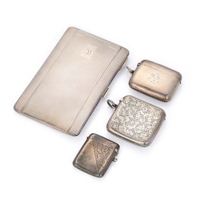 Lot 271 - A LARGE SILVER CIGARETTE CASE AND THREE SILVER VESTA CASES