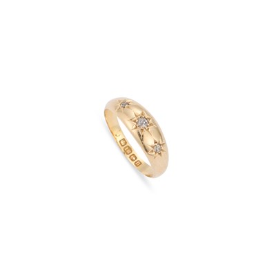 Lot 488 - AN 18 CARAT GOLD THREE STONE DIAMOND RING